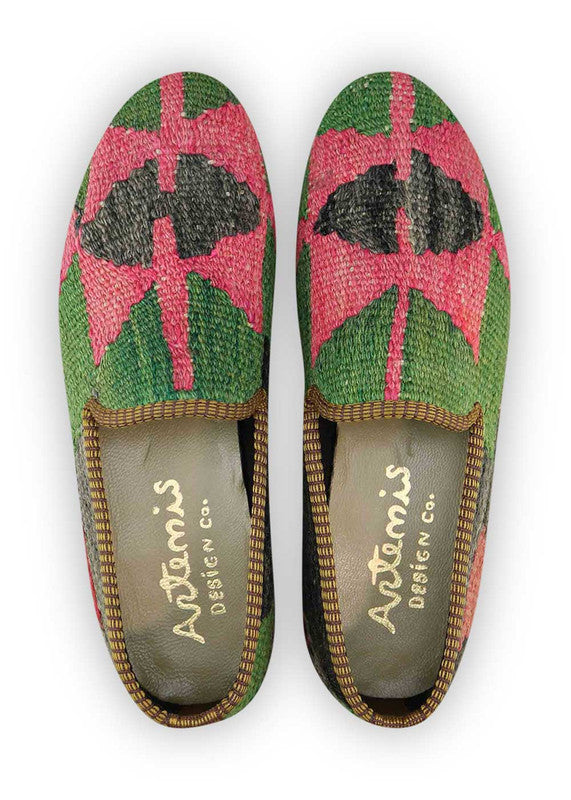 Artemis Design & Co Men's Loafers are a stylish and versatile choice for men. These loafers feature a unique color combination of green, fuschia, red, black, and dark grey, adding a touch of vibrancy to any outfit. Crafted with premium materials, these loafers offer exceptional comfort and durability, ensuring long-lasting wear.  (Front View)