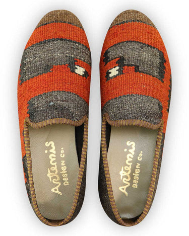 Artemis Design Co. Men's Loafers exude contemporary charm with a distinctive color combination of brown, pink, grey, red-orange, and black. Crafted with precision and style, these loafers effortlessly blend versatility with sophistication. Whether paired with casual or semi-formal attire, they add a touch of personality to any ensemble. (Front View)