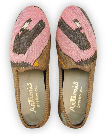 Artemis Design Co. Men's Loafers showcase a refined color palette, blending shades of pink, dark brown, light brown, and grey. Meticulously crafted, these loafers exude timeless elegance with a modern twist. Ideal for both casual and semi-formal occasions, they add a sophisticated touch to any ensemble. Elevate your footwear collection with Artemis Design Co. Men's Loafers, designed for the discerning gentleman who values style and craftsmanship. (Front View)