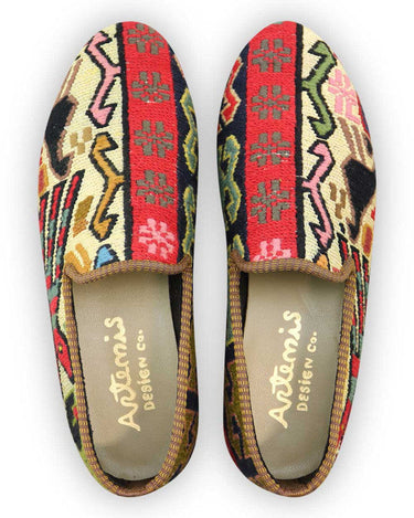 Artemis Design Co. Men's Loafers showcase a vibrant and eclectic color palette, featuring tones of red, brown, black, yellow, teal, pink, peach, and khaki. Meticulously crafted with attention to detail, these loafers offer a bold fusion of colors and styles. Whether paired with casual or semi-formal attire, they add a touch of personality and flair to any ensemble. (Front View)