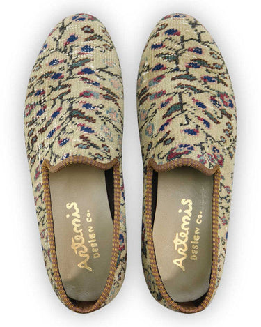 Artemis Design Co. Men's Loafers redefine sophistication with a captivating color palette featuring tones of khaki, brown, blue, maroon, peach, and grey. Expertly crafted, these loafers seamlessly blend timeless elegance with contemporary flair. The harmonious combination of colors adds depth and versatility to any outfit, making them a stylish choice for both casual and formal occasions. (Front View)