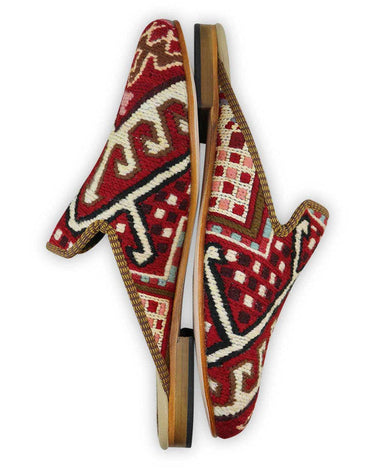 These slippers are designed to catch attention with their vibrant colors and contemporary style. The bold red and white hues create a visually pleasing contrast, while the touches of brown and pink add a subtle and unique twist. (Side View)